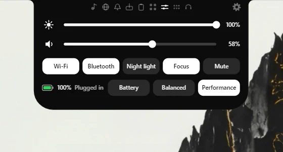 The Controls tab: brightness and volume sliders, and switches for Wi-Fi, Bluetooth, Night light, Focus and Mute