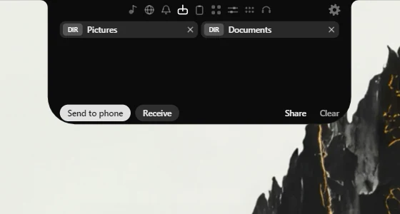 The file shelf holding a Pictures and a Documents folder, with Share and Clear